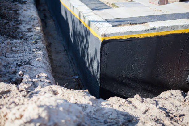 Professional Waterproofing technician working in Chantilly, VA